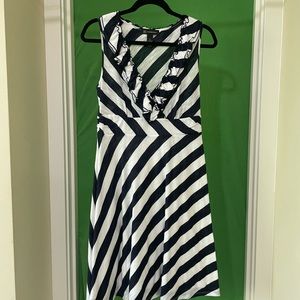 INC dress, polyester/rayon blend. Ruffled v-neck. Soft and flouncy. Size M.